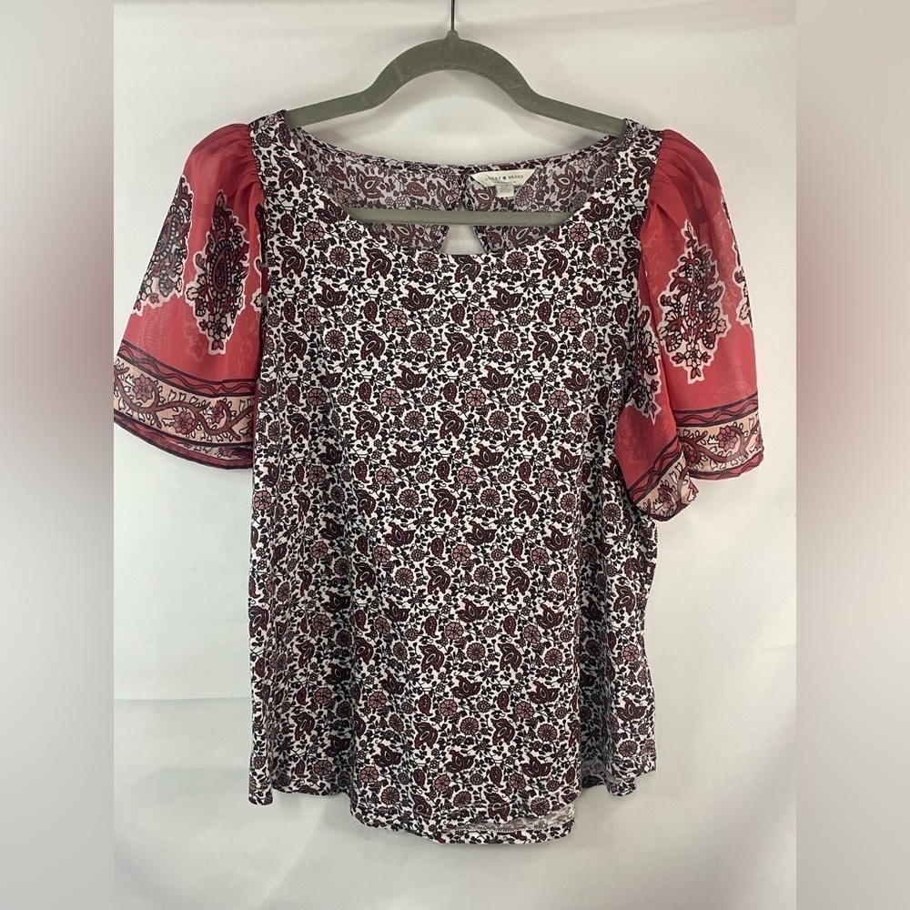 Lucky Brand Multi material blouse with a cut out panel in the back. Size Sm.